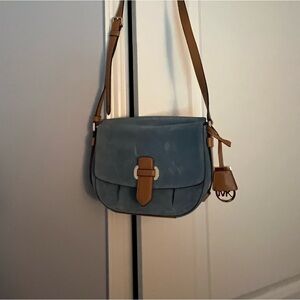 Michael Kors suede medium blue shoulder bag.
